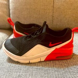 Nike size 10 black and red slip-on sneakers